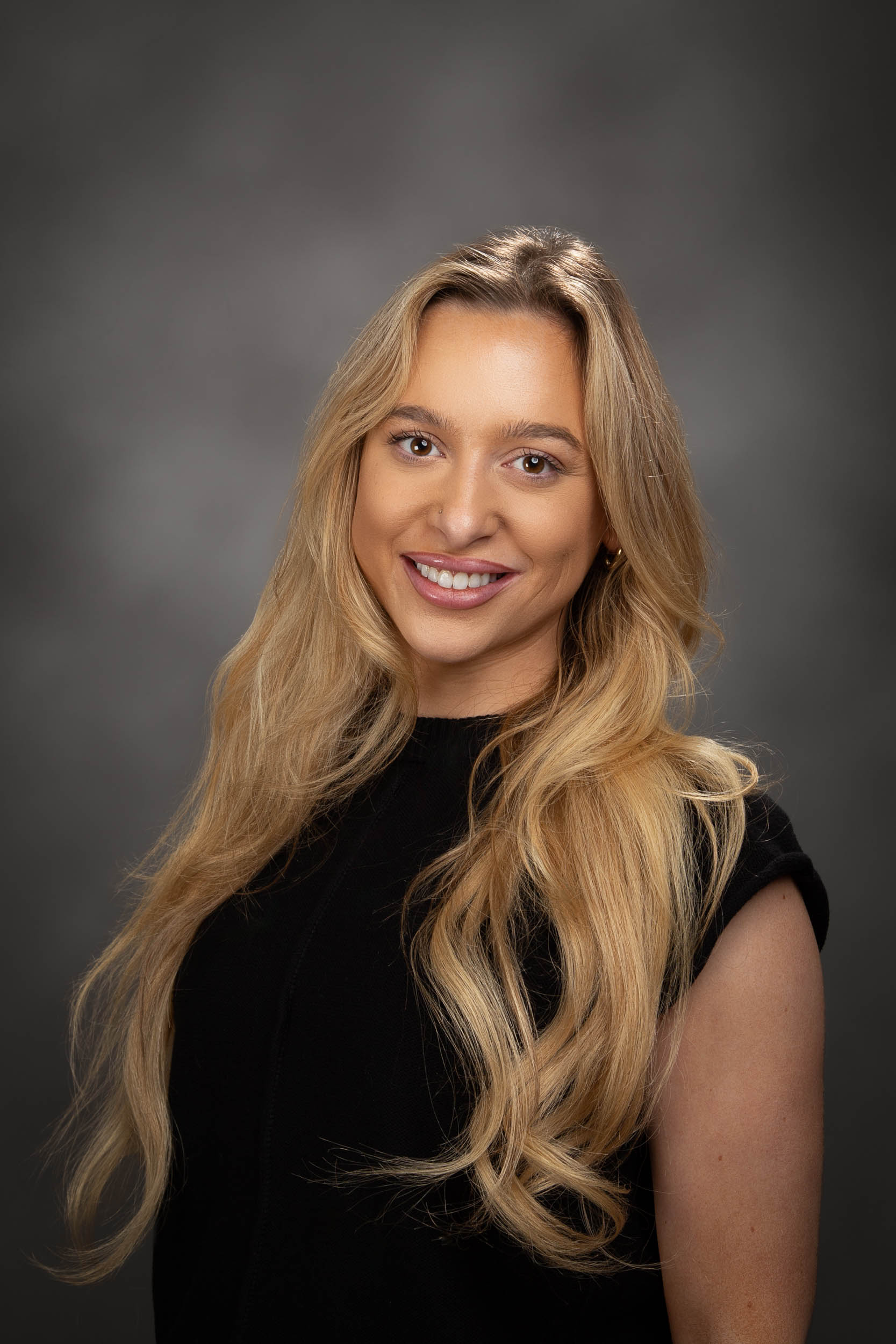 Sydney Holzer - Commercial Coordinator